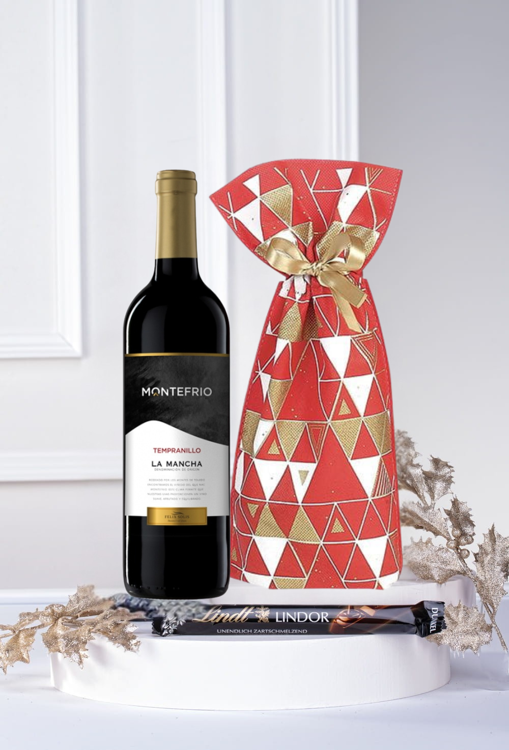 Elegancki Zestaw Prezentowy z Winem Montefrio i Czekoladą Lindt – Czerwono Złoty Worek Upominkowy