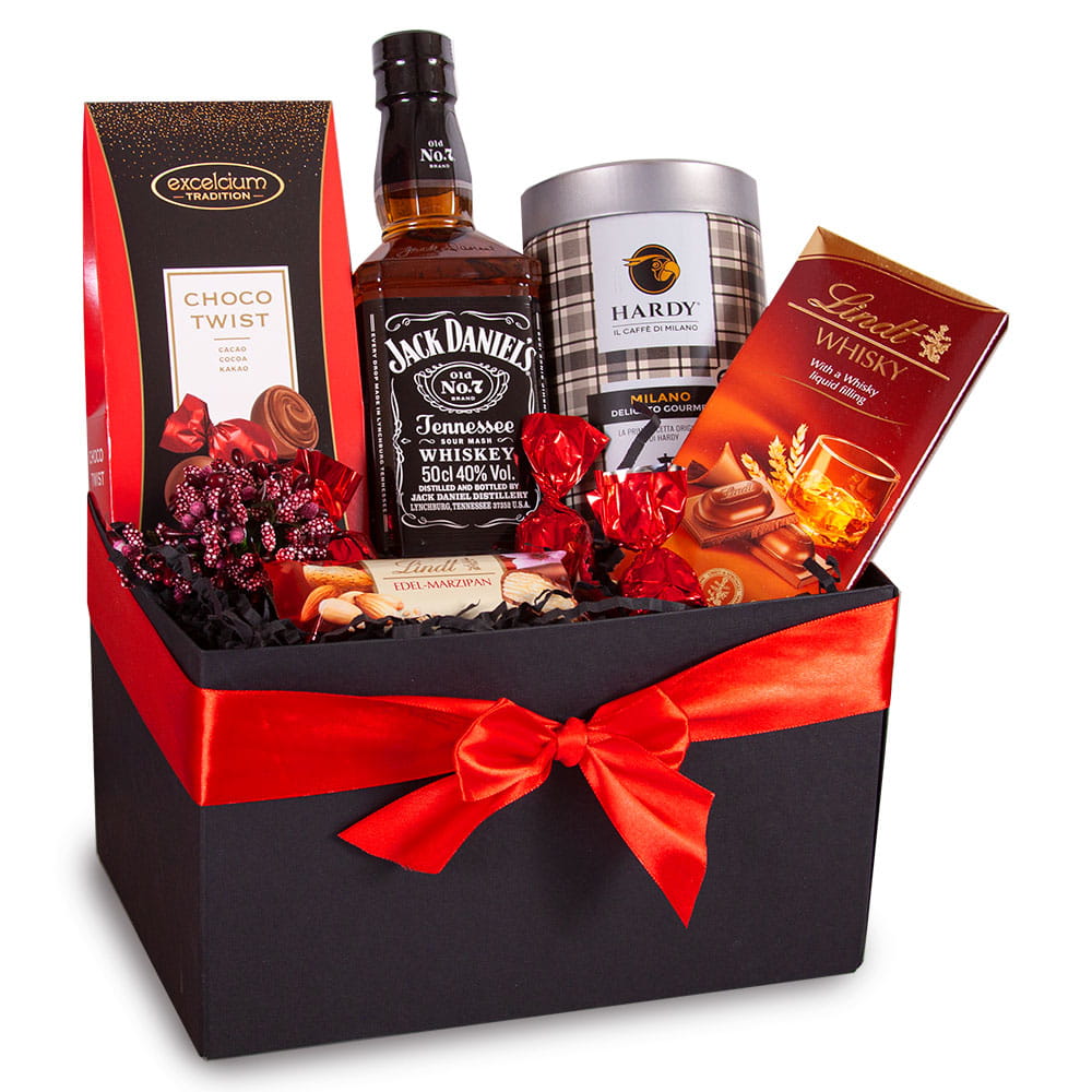 Ekskluzywny kosz prezentowy dla Niego z whiskey Jack Daniel's, kawą Lavazza i pralinami, w czarnym pudełku.