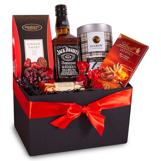 Ekskluzywny kosz prezentowy dla Niego z whiskey Jack Daniel's, kawą Lavazza i pralinami, w czarnym pudełku.